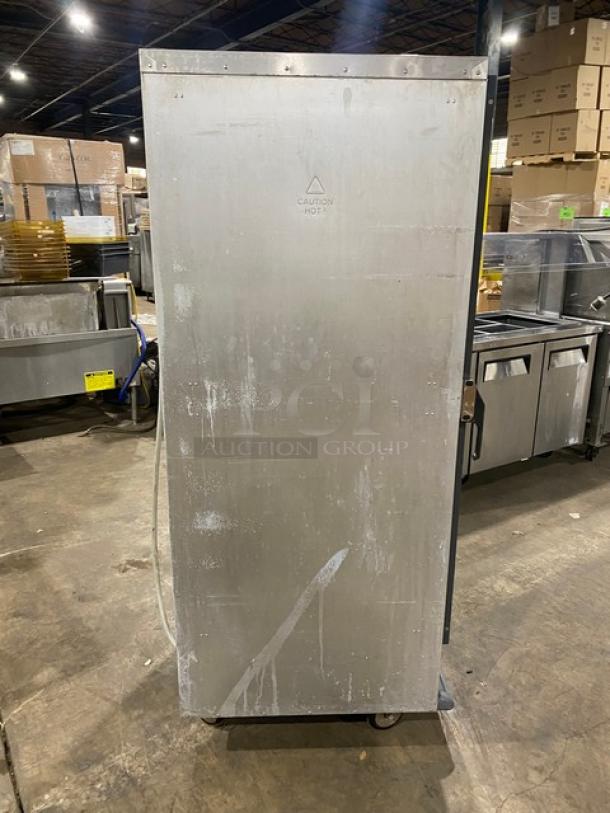 Metro C5-1 Series electric heated cabinet, Model C519-CFC-U, on casters. Used, visible wear, "Caution Hot" marking.