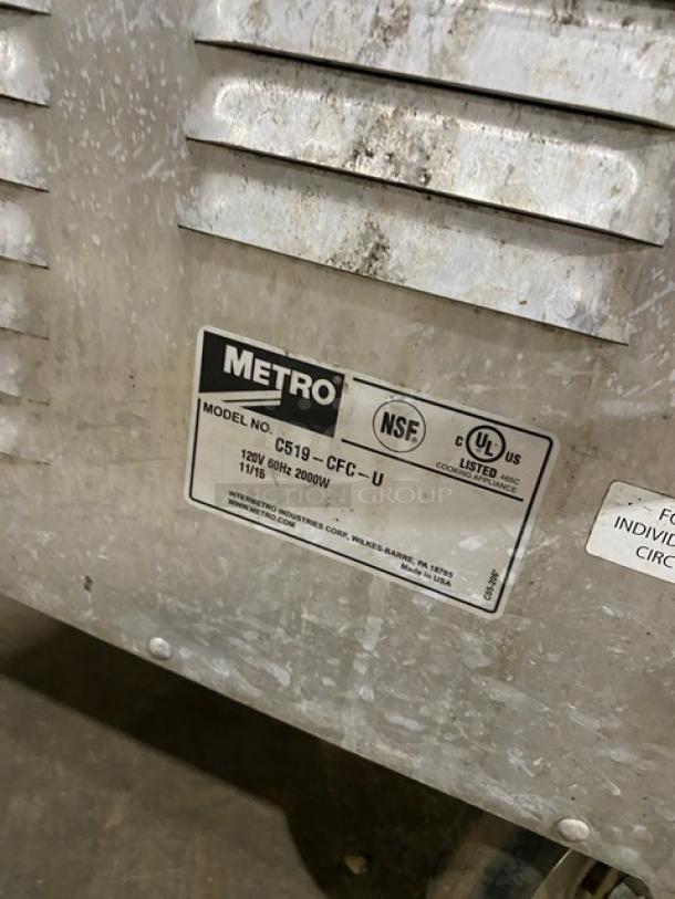Metro C5-1 Series commercial heated cabinet, Model C519-CFC-U, single glass door, 120V, on casters, label visible.