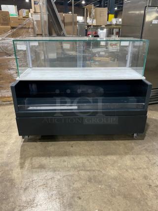 Structural Concepts black refrigerated merchandiser, model SBZ6652DR, with glass showcase, multi-level, 220V, on legs.