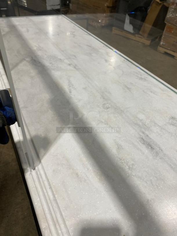 Structural Concepts SBZ6652DR refrigerated merchandiser with top glass showcase, white interior, and 220V power connection.