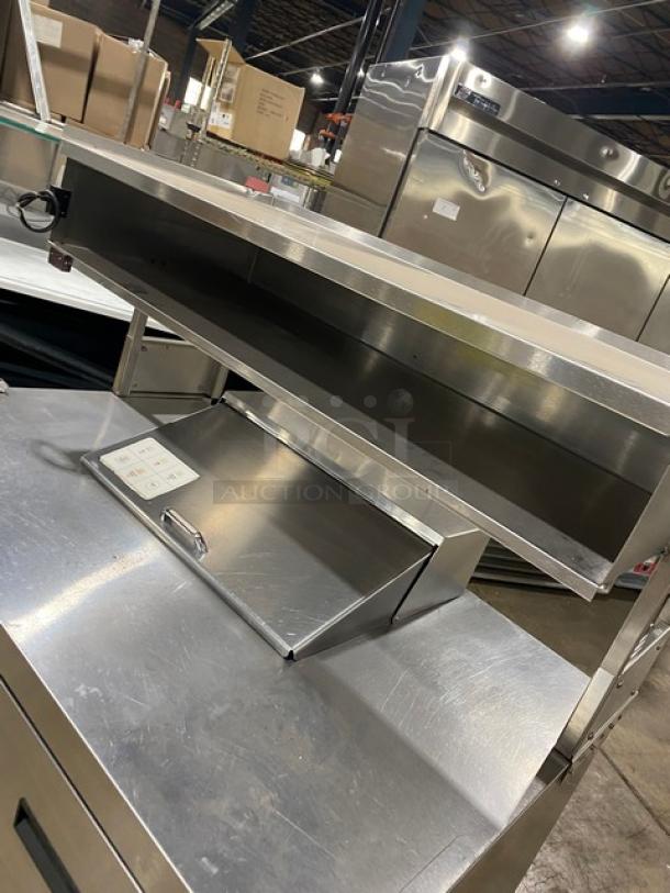 Delfield stainless steel 4-drawer refrigerated Bain Marie prep table with enclosed overhead storage. Mint condition.