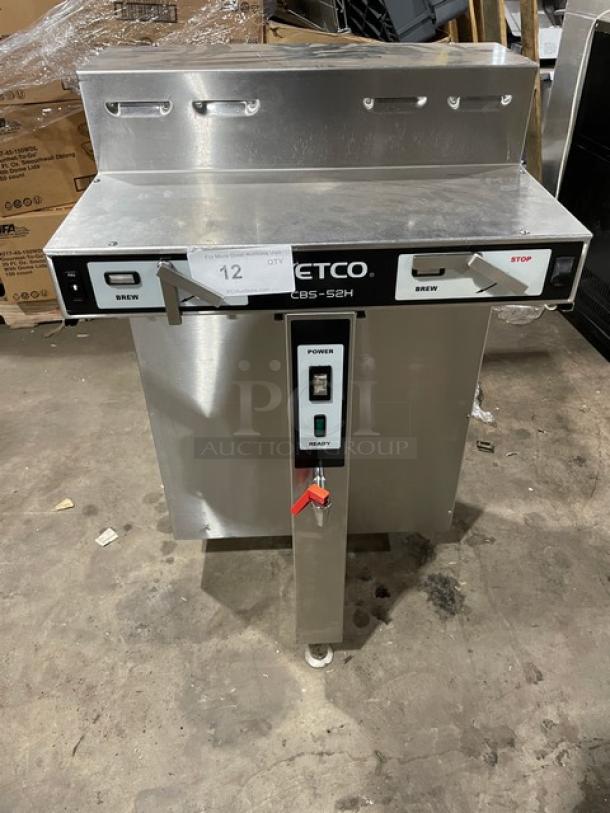 Fetco CBS-52H15 stainless steel twin coffee brewer, countertop model with hot water dispenser, 240V, on legs.
