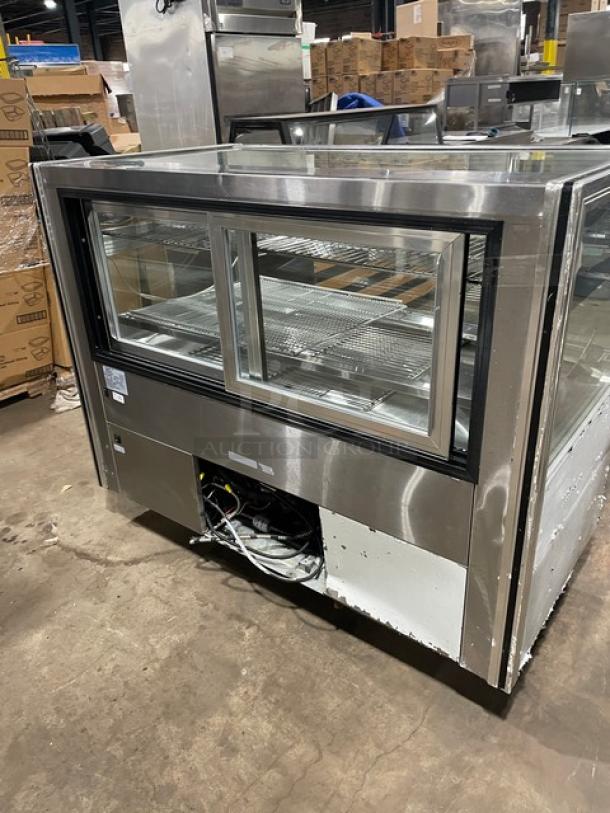Leader 57" stainless steel refrigerated bakery display case, model CBK57, adjustable racks, one phase, serial PT10s2004.