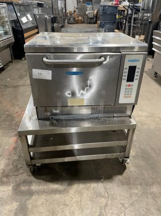 TurboChef NGC stainless steel rapid cook oven with digital controls, on a double undershelf equipment cart, ventless, on casters.