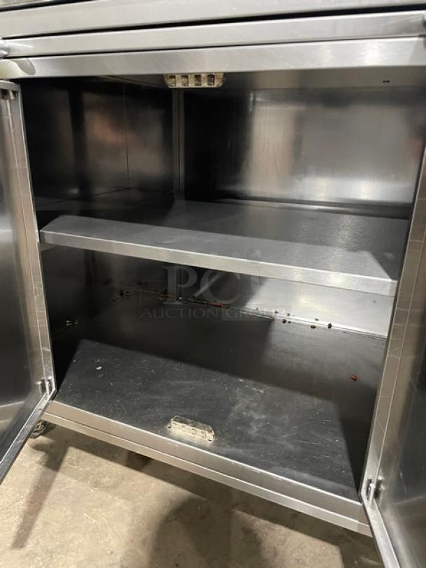 Rotisol 950.5 stainless steel gas rotisserie oven base, enclosed cabinet style, retractable workstation, on casters.