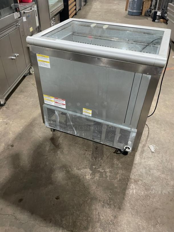 Beverage-Air stainless steel 2-door refrigerated prep table with glass top, cutting board, model SPE36HC-15M-STL, on casters.