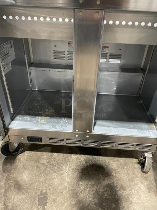 Beverage-Air stainless steel 2-door refrigerated prep table, model SPE36HC-15M-STL, on casters. Includes glass top and cutting board.