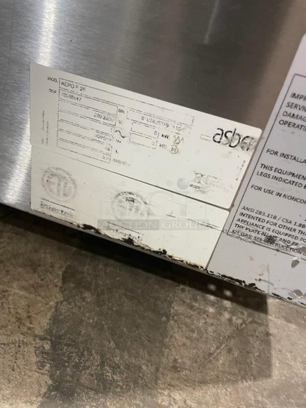 Asber AEPOE26 stainless steel countertop pizza deck oven with ceramic stone, electric, 220-240V, 1 phase, model label visible.