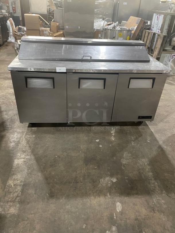 True TSSU-72-18 refrigerated bain marie prep table, stainless steel, three-door, on casters, 115V, used condition.