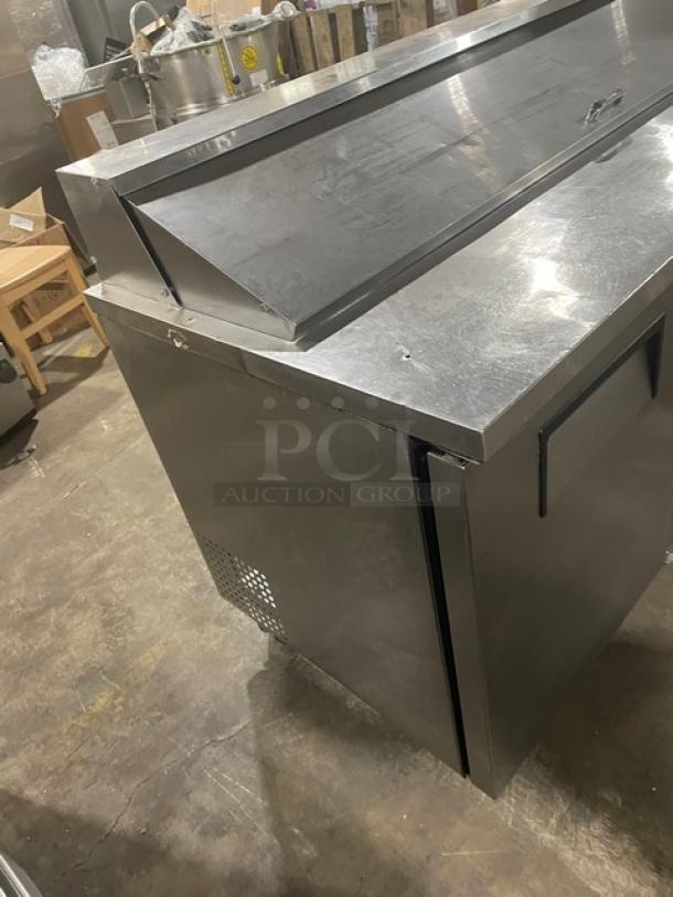 True Commercial Stainless Steel 3-Door Refrigerated Prep Table, Model TSSU-7218, Bain Marie style, on casters, good condition.