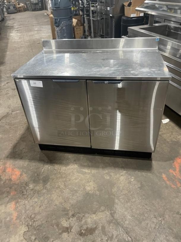Duke RUF48M Stainless Steel 2 Door Back Bar Counter, Energy Star, with Up-Turned Back Splash and Poly Coated Wire Racks.
