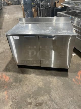 Duke RUF48M Stainless Steel 2 Door Back Bar Counter, Energy Star, with Up-Turned Back Splash and Poly Coated Wire Racks.