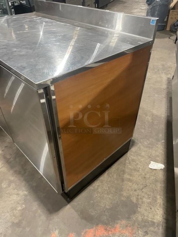 Duke Commercial Stainless Steel 2-Door Refrigerated Back Bar Counter with upturned backsplash. Model RUF-48M.