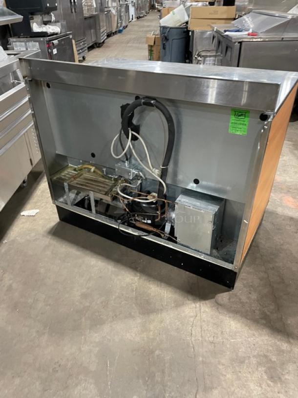 Duke 2-door stainless steel back bar counter, model RUF-48M, with Energy Star, up-turned backsplash, poly coated wire racks.