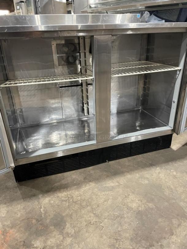 Duke RUF48M stainless steel 2-door back bar refrigerator with upturned backsplash, poly-coated wire racks, Energy Star certified.