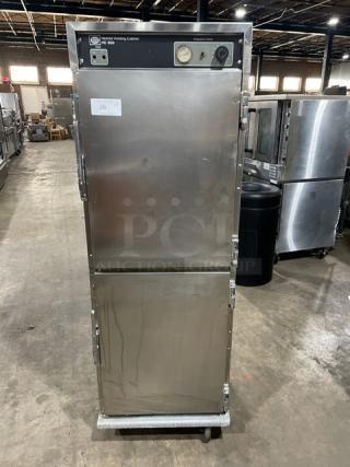 Henny Penny HC-900 heated holding cabinet, stainless steel, half door, full-size, electric, pan slides, on casters.