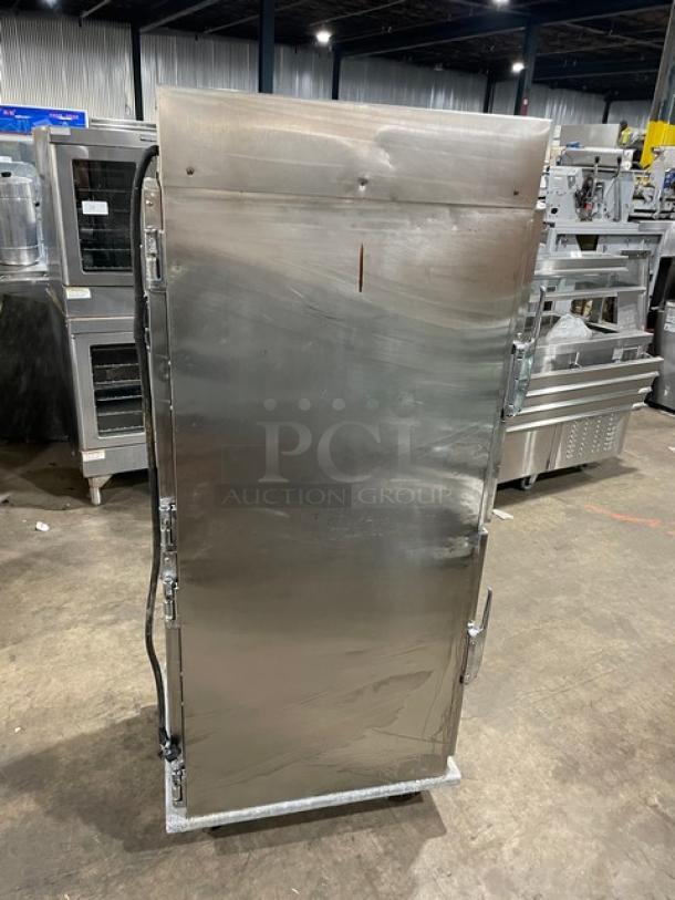 Henny Penny HC-900 heated holding cabinet, stainless steel, half door, built-in pan slides, on casters, SN: 03918.