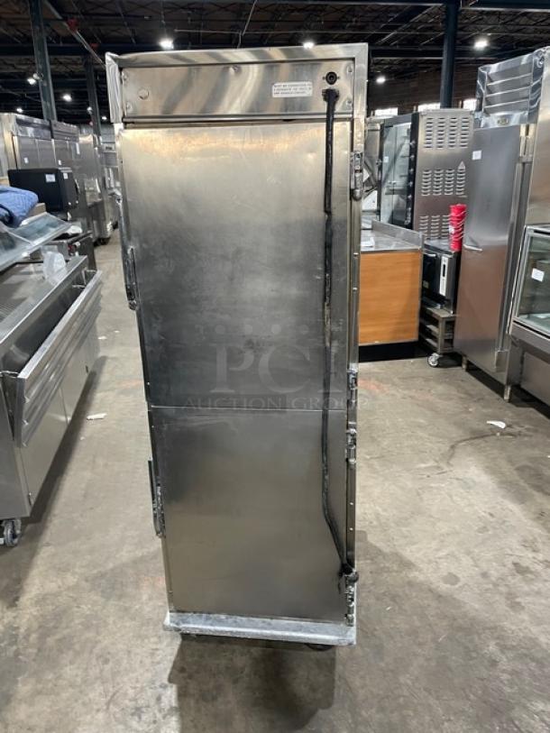 Henny Penny HC900 stainless steel heated holding cabinet with half door, built-in pan slides, on casters; 120V, 1 phase.