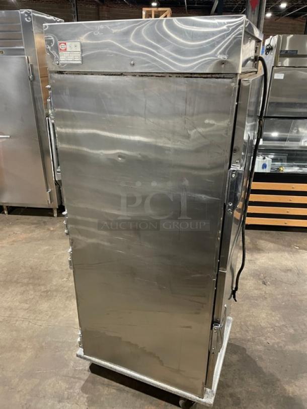 Henny Penny HC-900 stainless steel heated holding cabinet, half door, full-size, pan slides, on casters, 120V, electric.