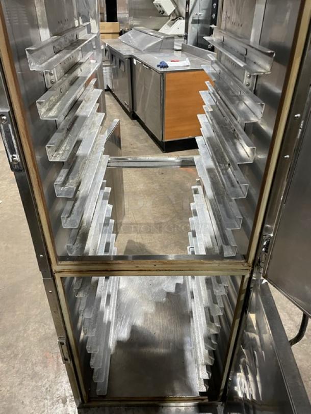 Henny Penny HC900 stainless steel heated holding cabinet with pan slides, half door, on casters, 120V, model SN: 03918.