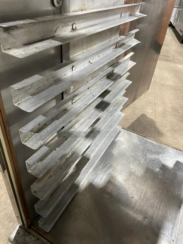 Henny Penny HC900 stainless steel heated holding cabinet with pan slides, half door, on casters. Model HC900, SN 03918.