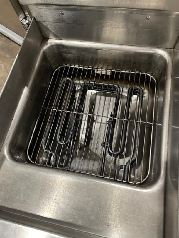 Keating 14CMBB stainless steel electric fryer, instant recovery, thermostatic control, backsplash, basket hanger, 240V 3-phase.
