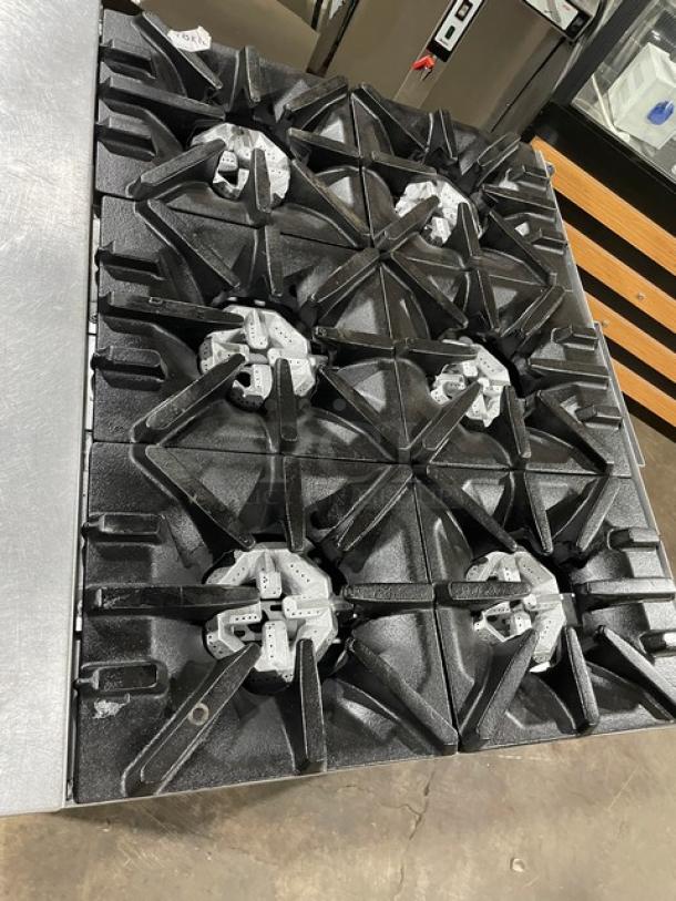 U.S. Range stainless steel 6-burner natural gas range with enclosed cabinet base, on casters, in good condition.