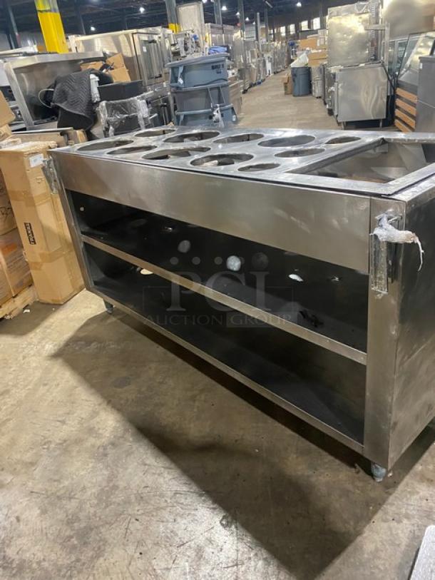 Commercial stainless steel enclosed cabinet with double shelf base, drop-in adapter plate, and drain hole on legs.