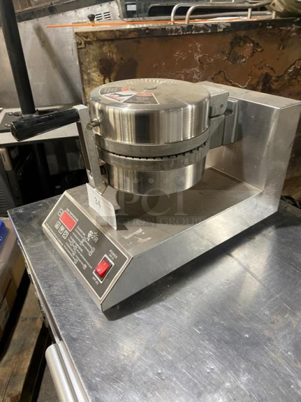 Star Commercial Stainless Steel Electric Belgian Waffle Maker, countertop model. Features a single waffle capacity and control panel. Slight wear visible.