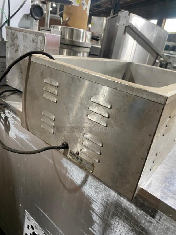 Nemco stainless steel electric countertop food warmer, single well, 120V, used condition, visible power cord attached.