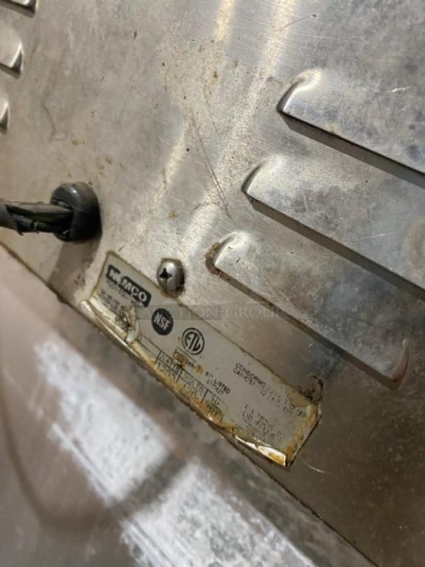 Nemco stainless steel electric countertop food warmer, single well, 120V. Visible wear, includes certification labels.