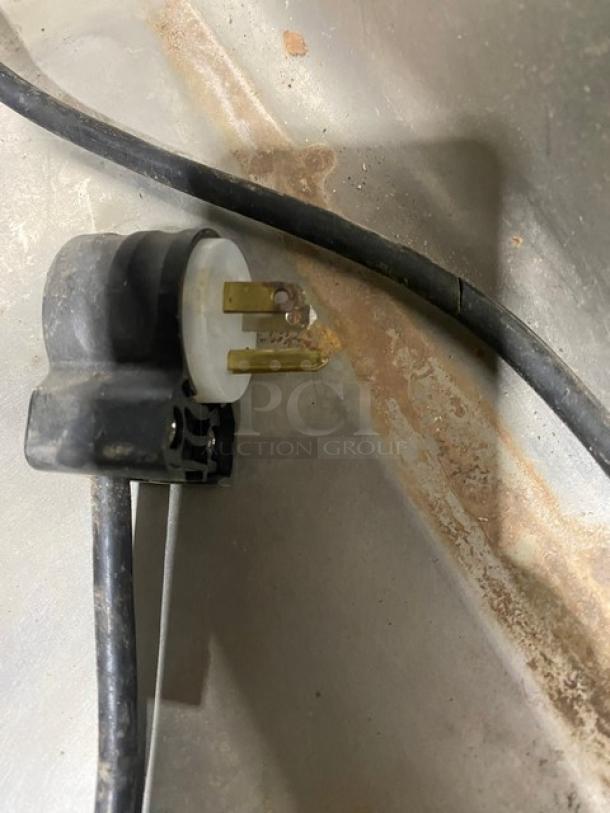 Nemco Commercial Food Warmer power plug, showing heavy-duty design. Suitable for 120V. Rugged, used condition.