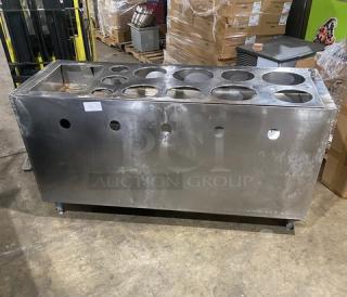 Commercial stainless steel enclosed cabinet with double shelf base, drop-in adapter plate, and drain hole, on legs.
