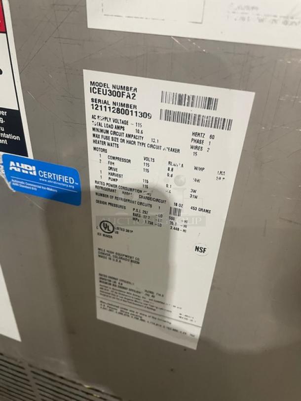 Ice-O-Matic ICEU300FA2 stainless steel ice maker, air-cooled, commercial use, Energy Star certified, 115V, on legs, serial tag shown.