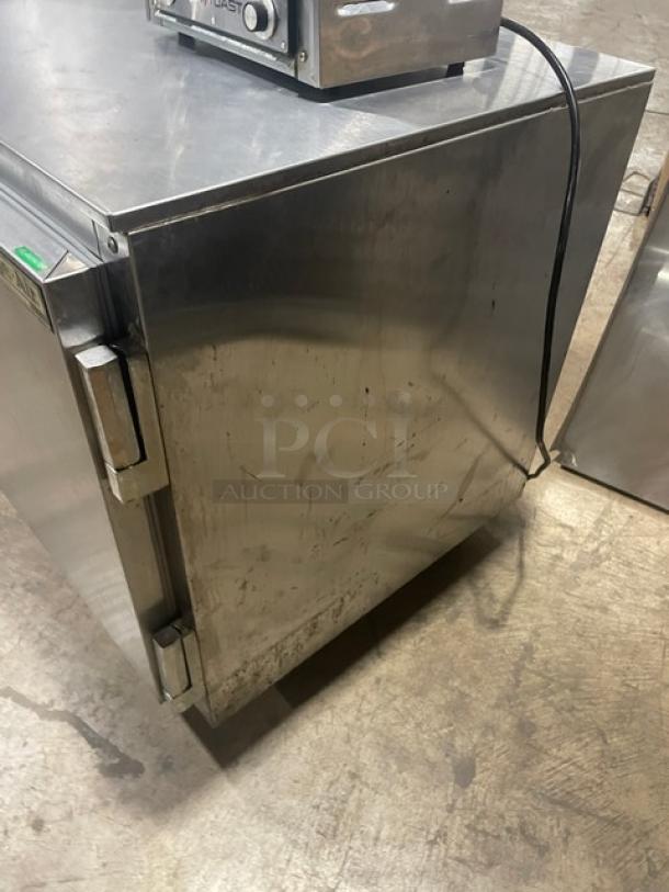 Beverage-Air UCR60A commercial stainless steel 2-door undercounter refrigerator, 60", on casters, with poly coated wire racks.