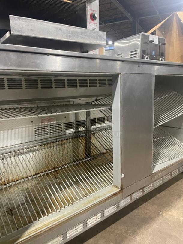 Beverage-Air UCR60A stainless steel 2-door undercounter refrigerator with poly-coated wire racks, on casters, 115V, 1 phase.