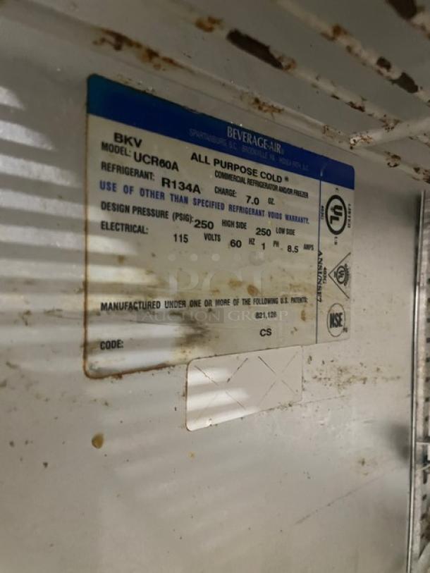 Beverage-Air UCR60A label, details refrigerant type R134A, electrical specs 115V, 1 phase, model tag visible, slight wear.