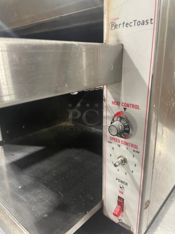 Sitaras PerfecToast 28LT commercial conveyor toaster, stainless steel, model 28LT, serial 9212, 208V, with heat and speed controls.