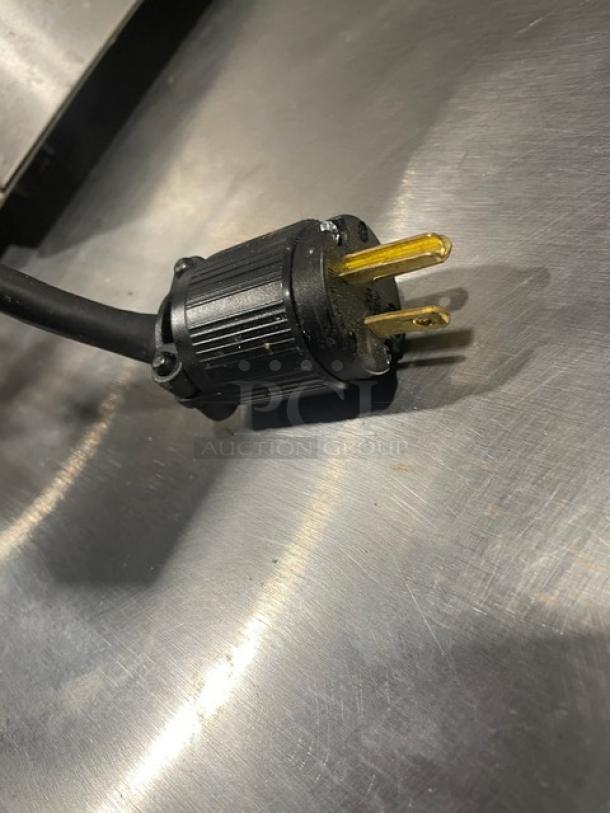 Sitaras PerfecToast commercial conveyor toaster plug, Model 28LT, 208V, stainless steel, in used condition, on legs.