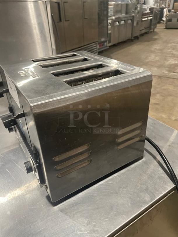 AvaToast CT100 stainless steel 4-slice commercial toaster, good condition, 208V, visible dial controls and vent design.