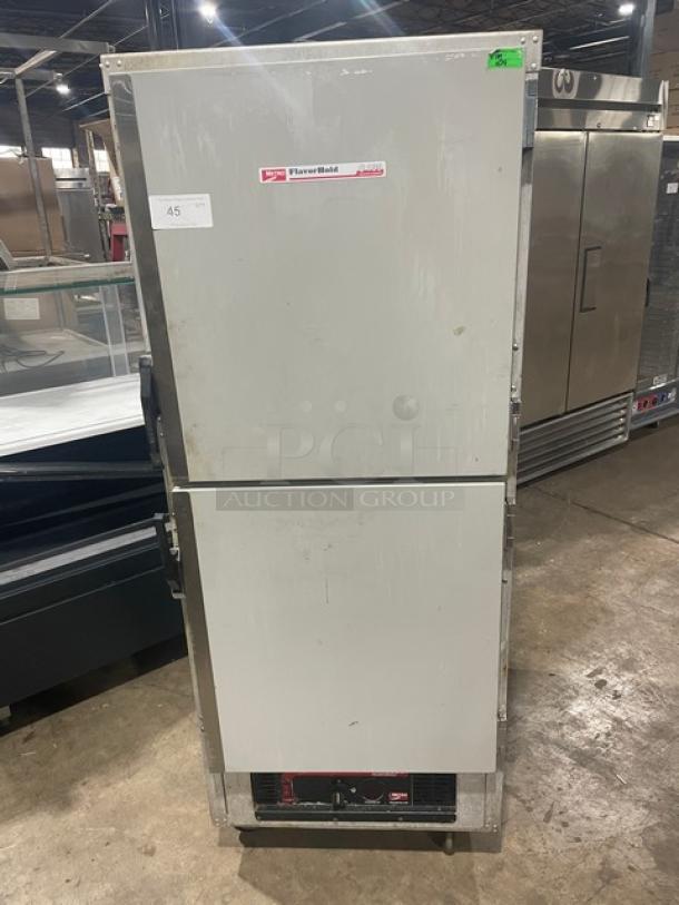 Metro Flavor Hold Series insulated mobile heated cabinet, Model C199H1N. Features half doors, pan slides, on casters.