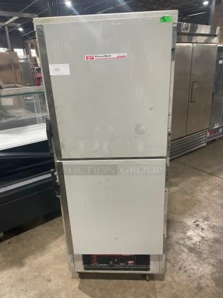 Metro Flavor Hold Series insulated mobile heated cabinet, Model C199H1N. Features half doors, pan slides, on casters.