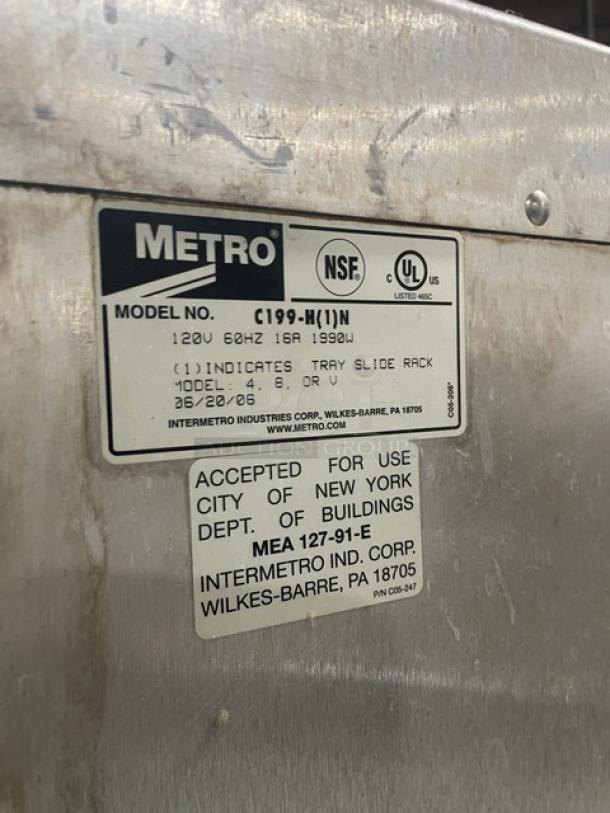 Metro Flavor Hold Series commercial holding/proofing cabinet, Model C199H1N, 120V, on casters, with labels showing specifications.