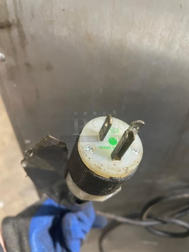 Power plug of Metro Flavor Hold Model C199H1N heated holding/proofing cabinet, 120V, visible in used condition.