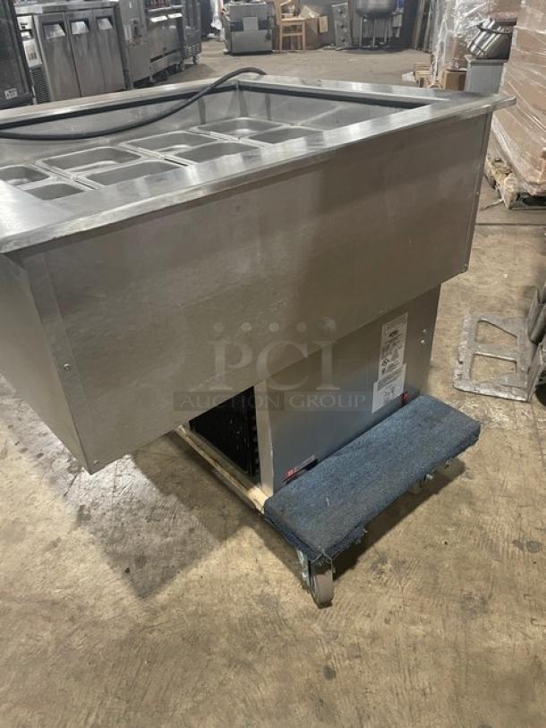 APW Wyott CW2 stainless steel refrigerated cold food well, electric, includes hotel pans, model label visible, used condition.
