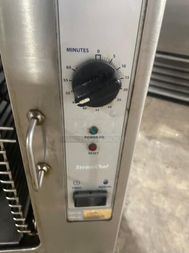 Cleveland Range SteamChef Series countertop convection steamer, model 22CGT6.1, stainless steel, natural gas, with timer dial and controls.
