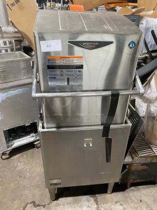 Hoshizaki stainless steel jet wash dishwasher, model JWE620UA6B. Energy Star certified, digital control panel, free-standing on legs.