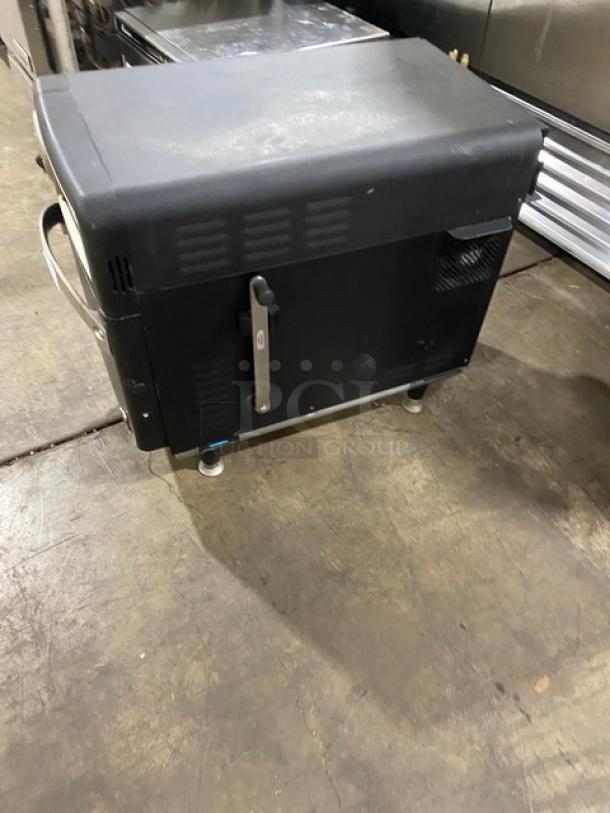 TurboChef NGO 2021 black electric countertop rapid cook oven, ventless, with crank bar, on legs, model NGOTD43530, 208/240V.