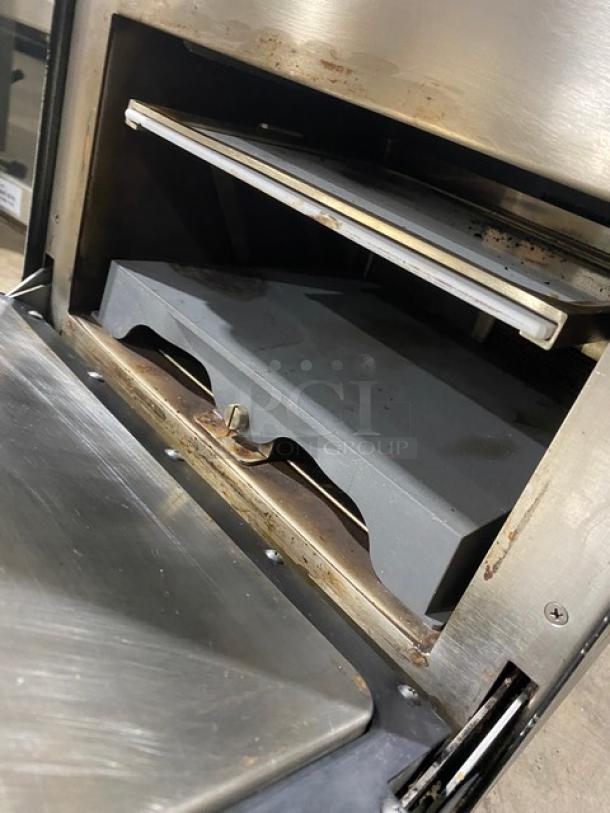 TurboChef NGO 2021 commercial ventless rapid cook oven, black, countertop model, visible crank bar, electric, used condition.