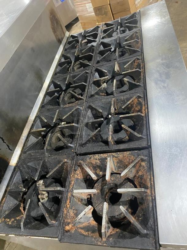 Bakers Pride 10 burner range with double oven, model 60BP10BS26N. Stainless steel, natural gas, overhead salamander shelf.